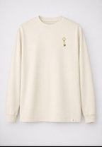 You feel it before you see it. Key of Blessings™ Long-Sleeve Signature Top – Ivory