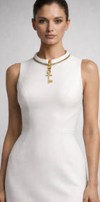 You don’t find the key—you become it. KB Key Necklace Zipper Dress – White Signature Edition