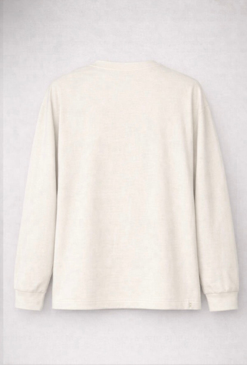 You feel it before you see it. Key of Blessings™ Long-Sleeve Signature Top – Ivory