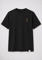 Your frequency creates your reality. Key of Blessings™ Spine Statement Tee – Black Men